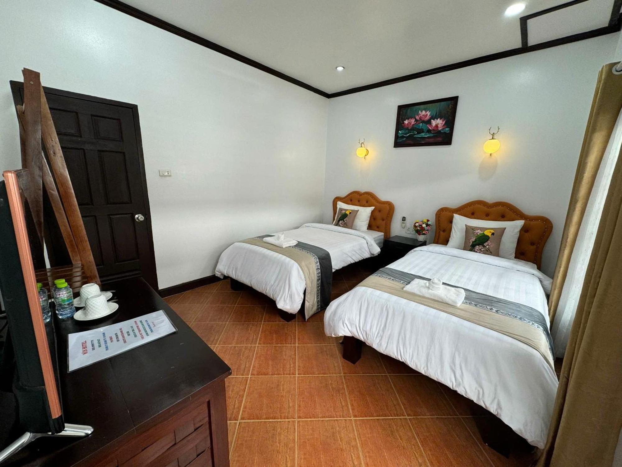 Win Hotel Vang Vieng Rum bild