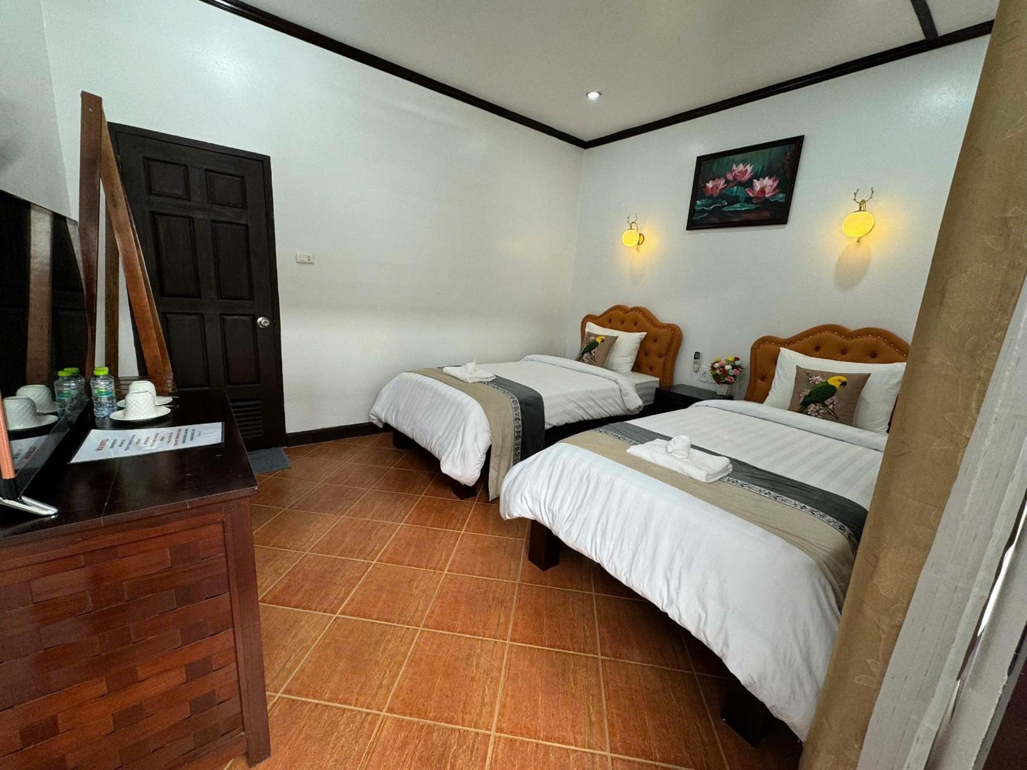 Win Hotel Vang Vieng Rum bild